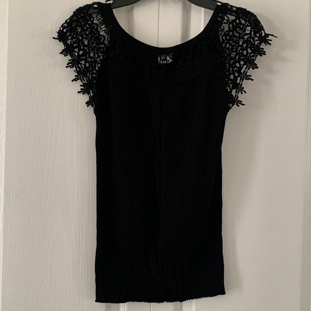 Alison Sheri ladies black stretchy top with crochet neckline and sleeves